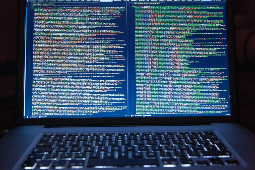 pexels-photo-177598-177598 Laptop displaying source code with dual screens for software development.
