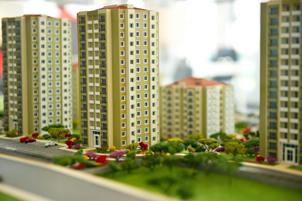 pexels-photo-3656188-3656188 Close-up image of a modern residential building model, showcasing urban architecture.